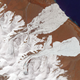 The Aru Glacier of western Tibet, as seen after two enormous ice slides on October 4th. Image: NASA Earth Observatory